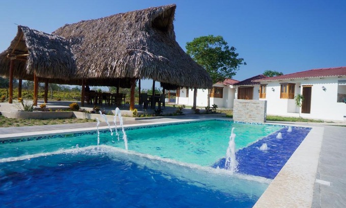 Sabanagrande House | Discover Cabaña DonJerónimo: Family-Friendly Oasis with Pool