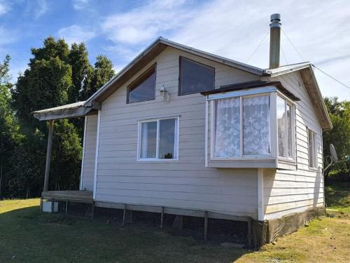 Ancud House | Cabaña Ola Azul