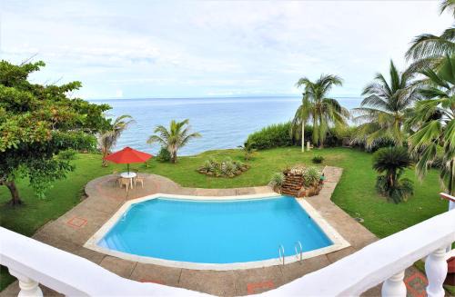 Puerto Escondido House | Beachfront Cabaña PEDREGAL: Guest Rated 9.6 with Pool