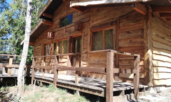 Pucon House | Rustic Cabin Retreat by the Trancura River with Kitchen