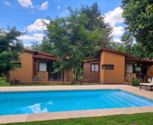 Santa Rosa de Calamuchita Hotel | Discover Cabañas Sukha: Ocean View with Pool Access