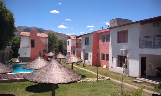 Potrero de los Funes Cabin | Relax at Cabañas El Doral with Ocean View & Pool Access