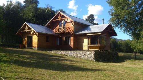 Pucon House | Idyllic Cabañas Los Canelos: Family-Friendly Retreat by River