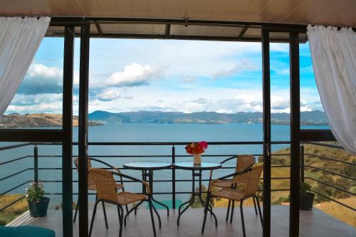Tota Apartment | Experience Cabañas los Sauces: Pet Friendly with Ocean Views