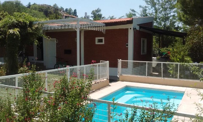 Potrero de los Funes Apartment | Relax at Cabañas Molinos de Vientos with Pool & Breakfast