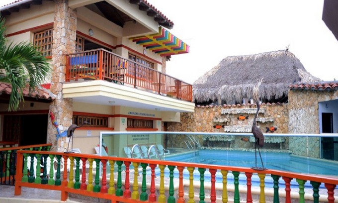 Palomino Apartment | Oceanfront Cabañas Vacacional Coveñas with Spa & Family Amenities