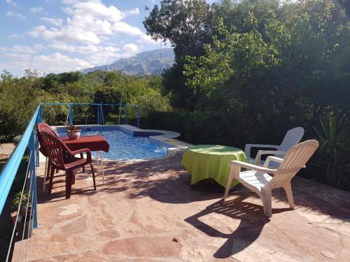 Merlo Cabin | Discover Cabañas Wayramuyu: Poolside Retreat with Breakfast