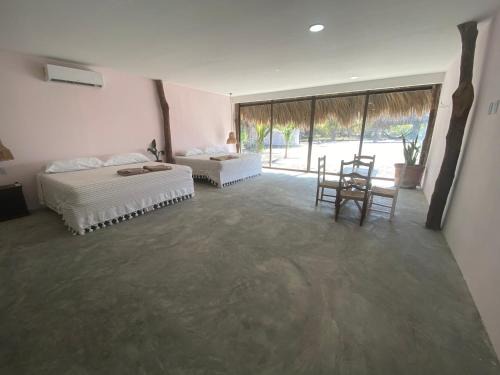 Tonala Hotel | Cabañas y Restaurante La Luna