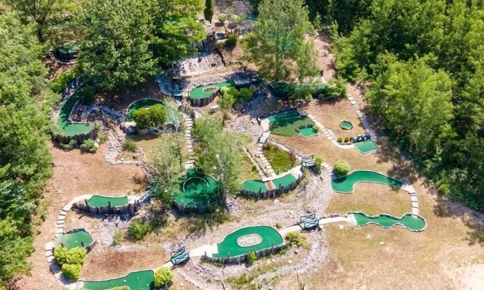 Gaylord House | Pet-Friendly Pond View Log Cabin in Private Resort, Rated 10/10