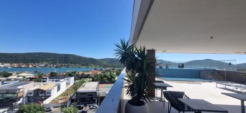 Passagem Apartment | Beachfront Hotel in Cabo Frio: Pool, Spa & Ocean Views