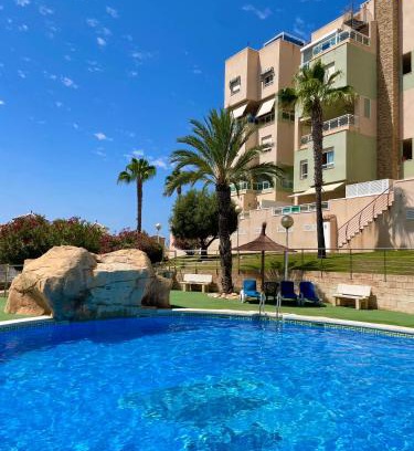 Cala Reona Apartment | Oceanfront Cala AZUL with BBQ & Pool - 4-Star Escape