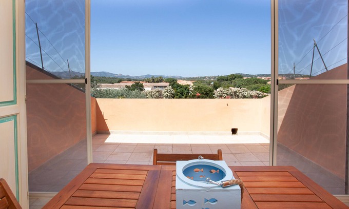 Capo Coda Cavallo Apartment | [★★★★★ Cala Brandinchi] Beach House with Terrace, Free Parking, Free WiFi