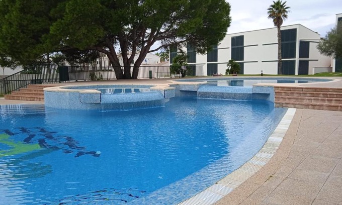 Ciudadela Apartment | Inviting Cala'n Bosch: Enjoy Ocean Views & Family-Friendly Fun