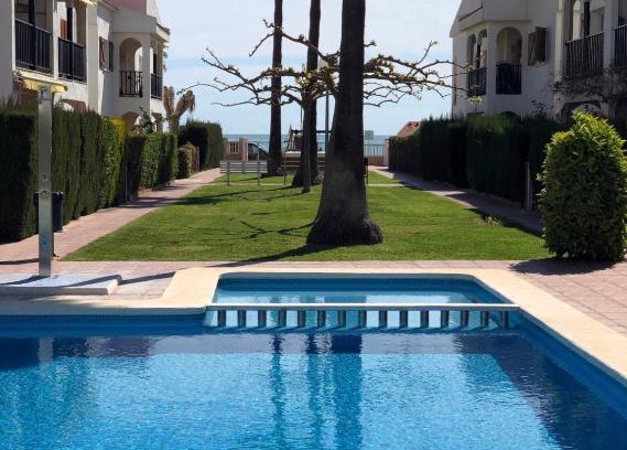 Vinaros Apartment | Experience Cala Puntal: Oceanfront Retreat with Pool Access