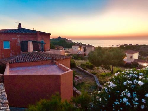 Canneddi Apartment | Discover Calarossa Village: Oceanfront Retreat with Breakfast