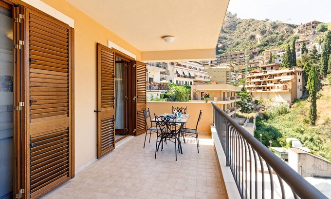 Taormina Apartment | Calipso Seaview Flat: Oceanfront Comfort with Private Parking