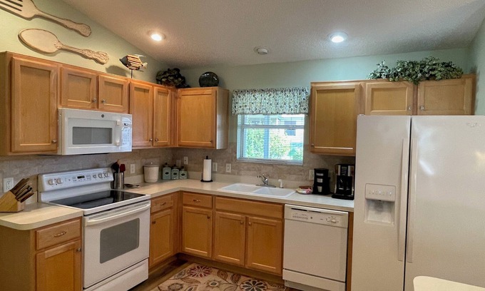 Woodbury House | Discover a Cozy Retreat with Pool and Golf Cart Access