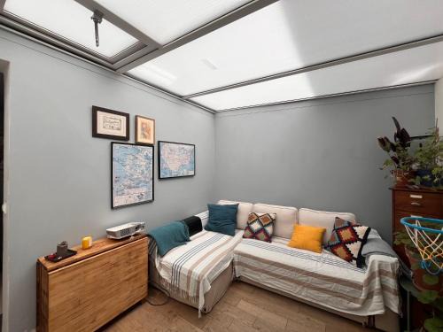 Quartier des peupliers Apartment | Serene Duplex Retreat in Paris 13th for Families