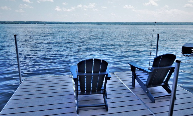 Seneca Falls House | Calm on Cayuga. Lakefront home on Cayuga Lake with dock and screened in porch