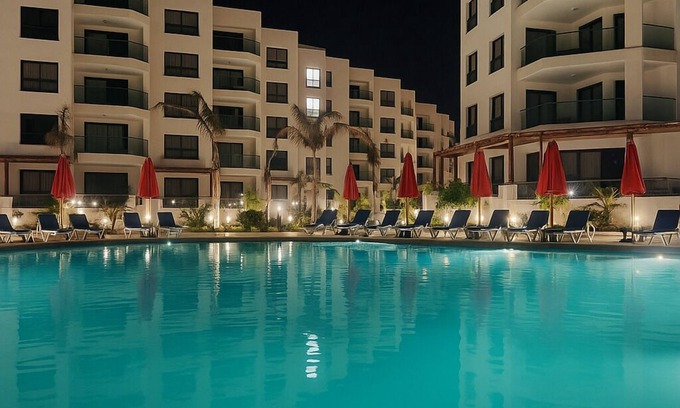 Al-Manasrah Ski Chalet | Porto Said Tourist Resort: Family-Friendly Hotel with Pool
