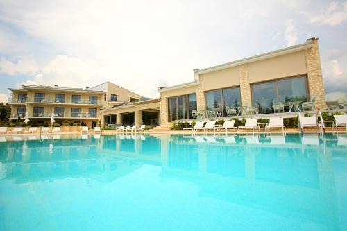 Kastoria Hotel | Relax at Calma Hotel & Spa: 4-Star Oceanfront Retreat