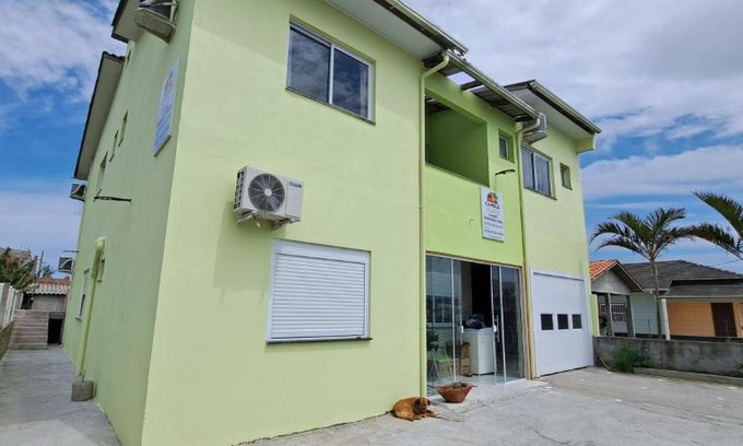 Balneario Arroio do Silva House | Cozy Suites at Camelo: Kitchen & Shared Lounge Experience