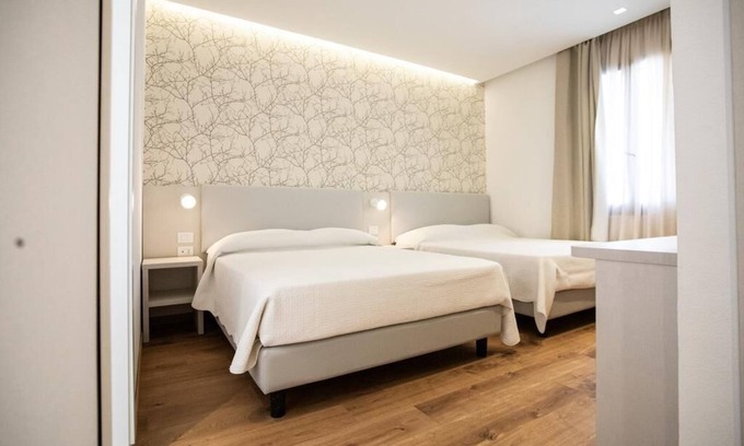 Torre Pedrera House | Deluxe Quadruple Room with Oceanfront Views & Spa Access