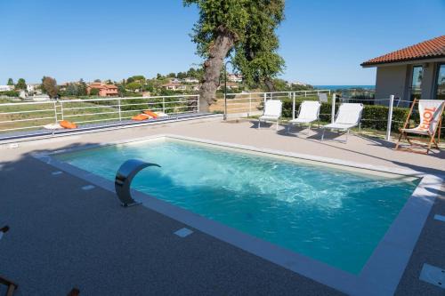 Villaggio Taunus House | Discover Camere Relais Filomare: Pet-Friendly with Ocean Views
