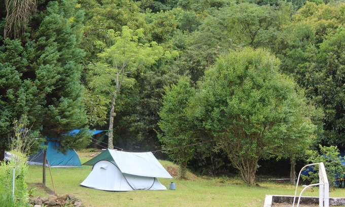 Munhoz RV Rental | Relaxing Camping Spot with Waterfall and Beach in Munhoz-MG