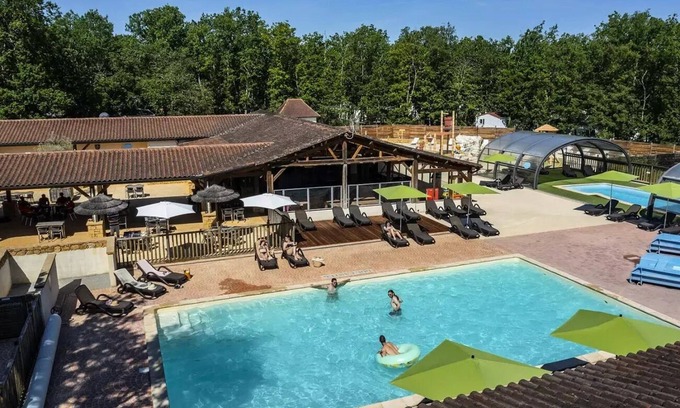Cenac-et-Saint-Julien House | Discover Camping Romanée Le Lou Castel: Family-Friendly Escape
