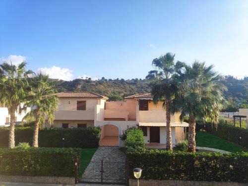 Campofelice di Roccella Apartment | Relax at Campofelice Holidays with Oceanfront Pool Access
