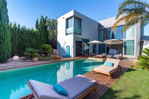 Sant Josep de sa Talaia Villa | Relax at Can Cool By Eivillas: Family-Friendly & Poolside