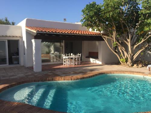 San Antonio Bay Villa | Stunning Can Fuentes: Oceanfront Retreat with Top Amenities