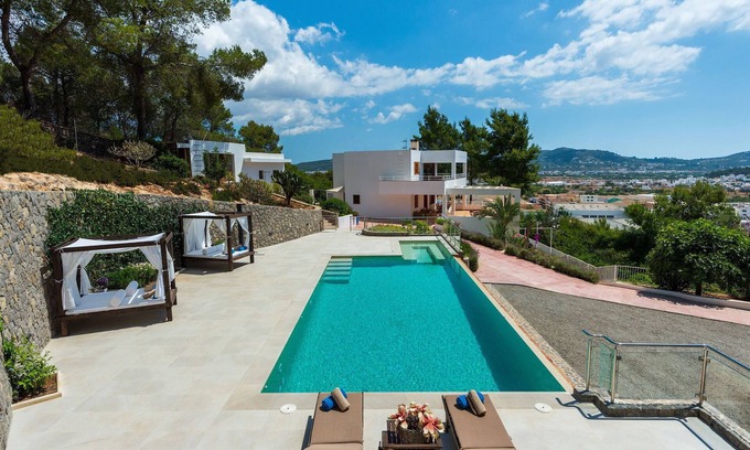 Santa Eulalia del Rio Villa | Can Malvinas: Oceanfront Retreat with Ibiza Town Views