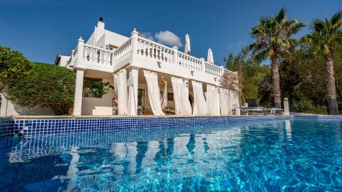 Sant Antoni de Portmany Villa | Unforgettable Oceanfront Retreat at Can Paradís Hotel