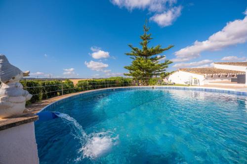 Llubi Villa | Experience Can Pintat: Oceanfront Poolside Retreat