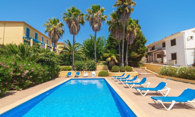 Cala Mandia Apartment | Relax at Can Suarez by Interhome: Oceanfront Oasis Awaits