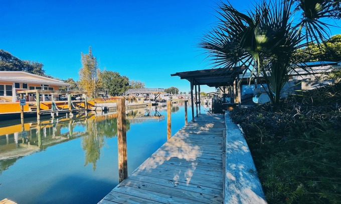 Indian Harbor Estates House | Idyllic Canal Front Escape with Pool and Boat Dock