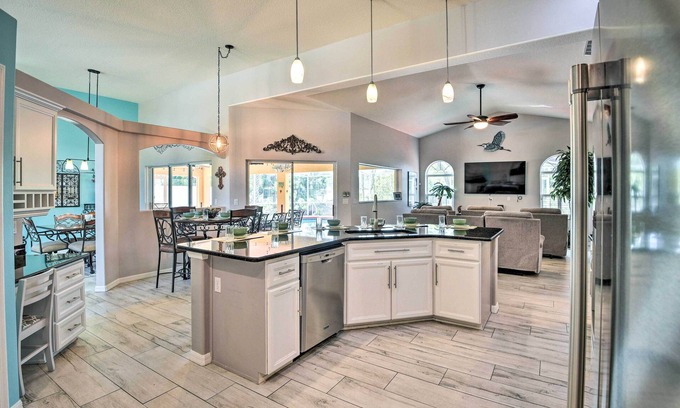 Palm Coast House | Canalfront Retreat with Heated Pool and Theater Room