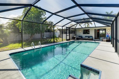 Edgewater House | Inviting Canal-Front Vacation Rental with Pool & Hot Tub