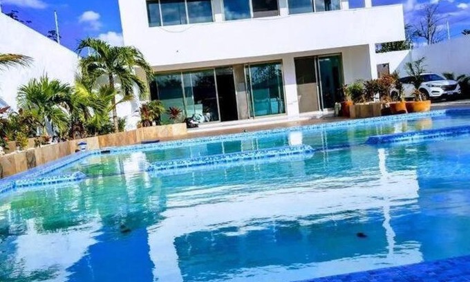 Alfredo V. Bonfil Villa | Pet-Friendly Cancun Jungle Mansion with Pool & Breakfast
