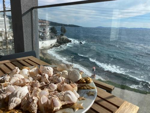 Neos Marmaras Apartment | Oceanfront Candi Suites: Guest Rated 9.9/10 for Families