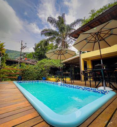 Vila do Abraao House | Experience Canoa Abraão: Oceanfront Bliss and Serenity
