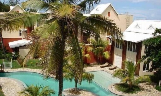 Bain Boeuf Apartment | Relax at Cape Garden Residence with Ocean Views & Spa