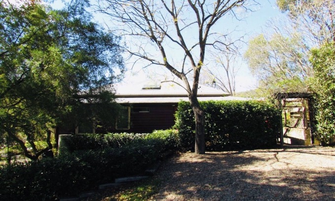 Wollombi Cottage | Experience Capers Cottage: Ocean View & Poolside Relaxation