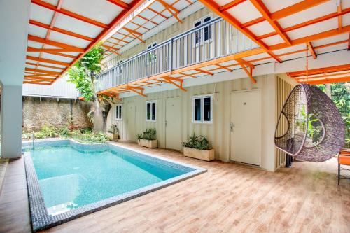 Cipete Selatan Hotel | Discover Capital O 3300 Nadjara Residence Syariah Hotel