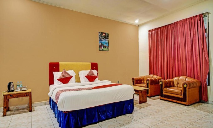 Kota Sidikalang Hotel | Child-Friendly Getaway at Capital O 92214 Beristera Hotel