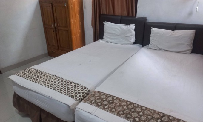 Purwokerto Hotel | Budget-Friendly Natura Guest House with Breakfast & Family Care