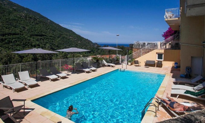 Porto Hotel | Inviting Capo D'orto: Oceanfront Stay with Pool & Breakfast