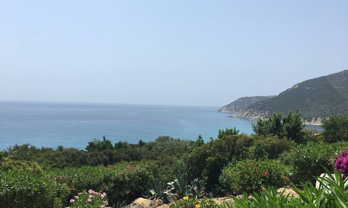 Porto Sa Ruxi House | Beachside Caposchiera Cottage with Pool & Ocean Views
